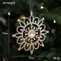 Champagne gold glitter snowflake ornament with center gem hanging on a Christmas tree - Snowflake Type B