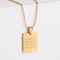 Golden square tag necklace with LOVE engraving and bead chain on white stone - LOVE EACH OTHER MORE