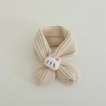 Detail of knitted beige baby scarf featuring a soft plush bunny patch and cross design - Small Animal Style / 60-80cm / Beige