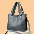 Blue-grey faux leather tote bag with cross-stitching, silver studs and purple strap - 9003 Lake Blue