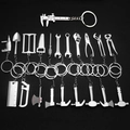 Creative silver zinc alloy tool keychains set featuring calipers and wrenches - 21-Piece Tool Set