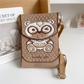 Detail of knitted bear crossbody phone bag with adjustable strap and metal buckle - Glasses Bear Khaki