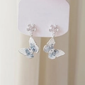 Detail showing blue and white crystal butterfly earrings with silver flower studs - 13# Blue Flower Butterfly Pendant Earrings