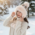 Creamy white plush winter hat with colorful plaid pattern and fluffy pom-pom accents - Pocket Multi-Pom Style / Beige
