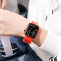 Square LED digital sports watch with orange silicone strap shown on wrist for daily use - Orange