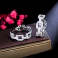 Elegant silver-toned chain drop earrings with sparkling rhinestones in a luxury setting - White Gold
