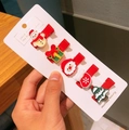 Detail of five-piece Christmas hair clips set with snowman and Santa motifs on red base - 5-Piece Christmas Hair Clip Collection