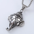 Close-up of vintage silver elephant head pendant with detailed metallic texture and antique finish - Distressed Elephant Head Pendant (Style 8)