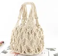 Detail of hand-woven cotton net bag with natural linen drawstring inner pouch - White