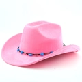 Detail of pink faux suede cowboy hat with ethnic beads and braided black trim - Magenta