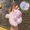 Pink plush keychain with flapping wings and golden metal ring for backpacks - Pull String Ball Capybara Pink