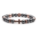 Cross beaded bracelet with tiger eye beads and rose gold zircon accents on white background - Rose Gold Hematite