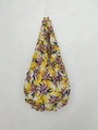 Detail of yellow floral stretch tote bag featuring unique textured bubble shrink fabric - Floral 17