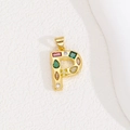 Detail of gold letter P pendant with colorful zircon stones and polished finish - Letter P