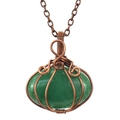 Detail of handmade copper wire-wrapped green natural stone pumpkin shaped pendant - Green (Aventurine)