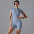 Detailed view of high-stretch yoga romper with front zipper closure and stand collar design - S / Haze Blue