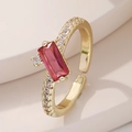 Close-up of gold-plated ring with a rectangle red gemstone and micro-pave zircons - Adjustable Open / Red