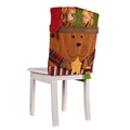 Christmas reindeer chair cover with red hat and star detail on white chair - Elk