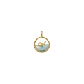 Detailed close-up of a gold whale pendant over a light blue gem in a round frame - Aurora Whale Pendant
