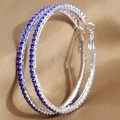 Oversized silver hoop earrings with blue rhinestones for women shown in a side view - 6cm / Silver Royal Blue Diamond 6cm