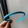 Slim satin headband in vibrant sky blue finish with glossy silk texture for women - Lake Blue