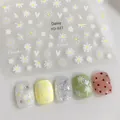 Detail view of YO-021 daisy and flower nail stickers with applied nail art effects - YO-021 Daisy