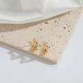 Exquisite gold cross stud earrings featuring sparkling zircon stone inlay for a chic look - Cross