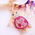 Pink rhinestone turtle keychain with gold plating and glittering moonstone crystals - Rose Red Rhinestone Turtle
