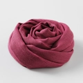Artistic deep pink cotton linen scarf folded into a rose shape on white background - Rose Red