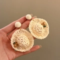 Close-up view of elegant handmade straw hat earrings featuring delicate floral accents - 72# Silver Post Style