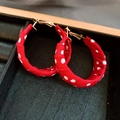 Detailed view of red and white polka dot fabric wrapped hoop earrings on a jewelry tray - Fabric Hoop Style (20#)