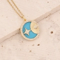 Macro view of gold pendant with turquoise, zircon accents and star shell engraving - Blue Turquoise Texture Style / Blue