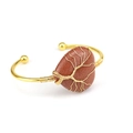 Detail of gold-wrapped heart-shaped red sandstone bangle with life tree wire pattern - Gold Sandstone
