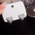Elegant silver heart-shaped stud earrings with textured finish on a jewelry card - Silver Heart Texture Studs (E2091-1)