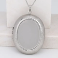 Silver stainless steel oval locket necklace with floral engraving and wave patterns - Textured Oval/Steel