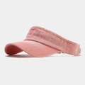Detail view of the pink washed denim texture and curved brim of the sun visor hat - Adjustable / Pink