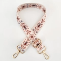 Detail of adjustable beige canvas strap with red and blue ethnic embroidery and gold hooks - Beige Ethnic Embroidery / Gold Buckle