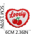 Detailed view of heart-shaped cherry embroidery patch with Lovely text and size markers - Heart Cherry (1)