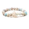 Elastic beaded bracelet with matte multi-colored stones and a white dolphin charm - Frosted Amazonite