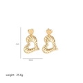 Exaggerated golden heart pendant earrings with irregular textured finish on white background - Gold Heart (A0191A)