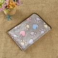 Gray flannel pet blanket with colorful heart and paw prints and brown edges - Coffee Paw Print with Hearts