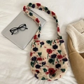 Close-up of fluffy beige teddy plush shoulder bag with colorful floral embroidery detail - Beige Red Small Flower