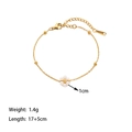 Detail view of handmade gold chain bracelet with pearl flower charm and product dimensions - A Pearl Flower Bracelet Gold.