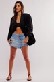 Full body view of women's casual outfit with black blazer and irregular denim shorts - S / Medium Blue & White
