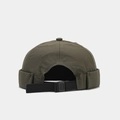 Detail of adjustable quick-release buckle and nylon fabric on olive green docker hat - Adjustable / Army Green