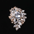 Elegant gold flower brooch with oval crystal and sparkling marquise rhinestones - MM-BR-0037 / Gold