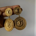 Vintage golden lion head drop earrings with embossed texture and elegant metal finish - Gold Lion Head