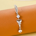Silver butterfly belly button ring with sparkling zircon stones in a macro shot - Dragonfly Pendant (Silver)