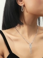 Close-up of silver bridal jewelry set with fringe necklace and teardrop rhinestone earrings - Tassel Necklace Water Drop Earring Set (DTN14026169S)