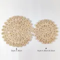 Detailed weave pattern of a 38cm wavy round handmade cornhusk placemat for table - 30cm / Style A